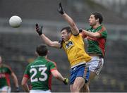 17 January 2016; Ian Kilbride, Roscommon, in action against Tom Parsons, Mayo. FBD Connacht League Section A Round 3, Roscommon v Mayo. Elvery's MacHale Park, Castlebar, Co. Mayo. Picture credit: David Maher / SPORTSFILE