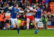 17 January 2016; Dermott McBride, Derry, in action against Gearoid McKiernan and Niall Murray, Cavan. Bank of Ireland Dr McKenna Cup, Semi-Final, Cavan v Derry. Athletic Grounds, Armagh. Picture credit: Mark Marlow / SPORTSFILE