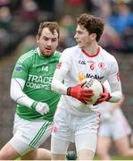 17 January 2016; Rory Brennan, Tyrone, in action against Sean Quigley, Fermanagh. Bank of Ireland Dr McKenna Cup Semi-Final, Tyrone v Fermanagh. St Tiernach's Park, Clones, Co. Monaghan. Picture credit: Oliver McVeigh / SPORTSFILE