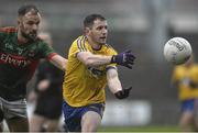 17 January 2016; Ciaran Miurtagh, Roscommon, in action against Jason Gibbons, Mayo. FBD Connacht League Section A Round 3, Roscommon v Mayo. Elvery's MacHale Park, Castlebar, Co. Mayo. Picture credit: David Maher / SPORTSFILE