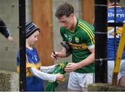 17 January 2016; Tipperary supporter Sean Lewis, aged 9, from Monard, Co. Tipperary, gets his jersey signed after the game by Kerry's Jonathan Lyne. McGrath Cup Group A Round 3, Tipperary v Kerry. Sean Treacy Park, Tipperary. Picture credit: Diarmuid Greene / SPORTSFILE