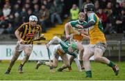 17 January 2016; Jonjo Farrell, Kilkenny, takes on Offaly's, from left, Paddy Rigney, Conor Doughan and Niall Wynne. Bord na Mona Walsh Cup Group 1, Offaly v Kilkenny. St Brendan's Park, Birr, Co. Offaly. Picture credit: Piaras Ó Mídheach / SPORTSFILE