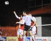 23 October 2009; Clive Delaney, Derry City, in action against Darragh Ryan and David Partridge, St Patrick's Athletic. League of Ireland Premier Division, St Patrick's Athletic v Derry City, Richmond Park, Dublin. Picture credit: Matt Browne / SPORTSFILE