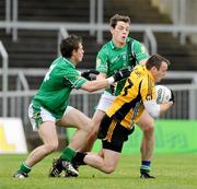 24 October 2009; Paddy Bradley, Ulster, in action against Emmet Bolton, left, and John O’Loughlin, Leinster. M Donnelly Interprovincial Football Semi-Final, Ulster v Leinster, Crossmaglen, Co. Armagh. Photo by Sportsfile