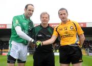 24 October 2009; Referee Vincent Neary with Leinster captain Dermot Earley and Ulster captain Stephen O’Neill before the start of the game. M Donnelly Interprovincial Football Semi-Final, Ulster v Leinster, Crossmaglen, Co. Armagh. Photo by Sportsfile