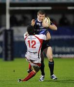 24 October 2009; Gordon D'Arcy, Leinster, is tackled by Ian Whitten, Ulster. Celtic League, Ulster v Leinster, Ravenhill, Belfast. Picture credit: Oliver McVeigh / SPORTSFILE