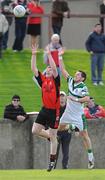 25 October 2009; Thomas Murphy, Mattock Rangers, in action against Craig Rogers, Portlaoise. AIB Leinster Club Senior Football Championship First Round, Mattock Rangers v Portlaoise, Drogheda, Co. Louth. Photo by Sportsfile