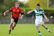 25 October 2009; Craig Rogers, Portlaoise, in action against Sean Gilsenan, Mattock Rangers. AIB Leinster Club Senior Football Championship First Round, Mattock Rangers v Portlaoise, Drogheda, Co. Louth. Photo by Sportsfile