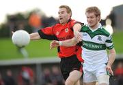 25 October 2009; David Brennan, Mattock Rangers, in action against Barry Fitzgerald, Portlaoise. AIB Leinster Club Senior Football Championship First Round, Mattock Rangers v Portlaoise, Drogheda, Co. Louth. Photo by Sportsfile