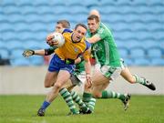 25 October 2009; John Brogan, Knockmore, in action against Paul Mulligan and Richard Haran, right, Charlestown Sarsfields. Mayo County Senior Football Final, Knockmore v Charlestown Sarsfields, McHale Park, Castlebar, Co. Mayo. Picture credit: Brian Lawless / SPORTSFILE