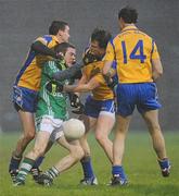 25 October 2009; David Caffrey, Charlestown Sarsfields, in action against, from left, Stephen Sweeney, Peter Clarke, and Kevin O'Neill, Knockmore. Mayo County Senior Football Final, Knockmore v Charlestown Sarsfields, McHale Park, Castlebar, Co. Mayo. Picture credit: Brian Lawless / SPORTSFILE