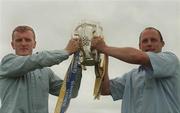 28 August 2002; Brian Lohan, Clare captain, (left) and Andy Comerford, Kilkenny captain, pictured with the Liam MacCarthy Cup, prior to their meeting in the All Ireland Hurling Final, The Palace Hotel, Cashel, Co. Tipperary. Picture credit; David Maher / SPORTSFILE