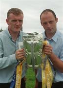 28 August 2002; Brian Lohan, Clare captain, (left) and Andy Comerford, Kilkenny captain, pictured with the Liam MacCarthy Cup, prior to their meeting in the All Ireland Hurling Final, The Palace Hotel, Cashel, Co. Tipperary. Picture credit; David Maher / SPORTSFILE