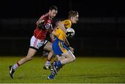 22 January 2016; Pierce Lillis, Clare, in action against Kevin O'Driscoll, Cork. McGrath Cup Football Final, Cork v Clare, Mallow GAA Complex, Mallow, Co. Cork. Picture credit: David Maher / SPORTSFILE