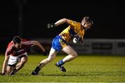 22 January 2016; Pierce Lillis, Clare, in action against Kevin O'Driscoll, Cork. McGrath Cup Football Final, Cork v Clare, Mallow GAA Complex, Mallow, Co. Cork. Picture credit: David Maher / SPORTSFILE