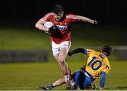 22 January 2016; Tomas Clancy, Cork, in action against Sean Collins, Clare. McGrath Cup Football Final, Cork v Clare, Mallow GAA Complex, Mallow, Co. Cork. Picture credit: David Maher / SPORTSFILE