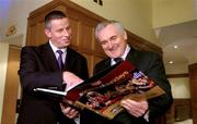 6 December 2004; New Dublin football manager Paul Caffrey with An Taoiseach Bertie Ahern TD, at the launch of &quot;A Season of Sundays 2004&quot;, a collection of images from the 2004 Gaelic Games year by the Sportsfile photographers. Clarence Hotel, Dublin. Picture credit; Brendan Moran / SPORTSFILE