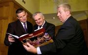 6 December 2004; New Dublin football manager Paul Caffrey with An Taoiseach Bertie Ahern TD, and Ray McManus, of Sportsfile, at the launch of &quot;A Season of Sundays 2004&quot;, a collection of images from the 2004 Gaelic Games year by the Sportsfile photographers. Clarence Hotel, Dublin. Picture credit; Brendan Moran / SPORTSFILE