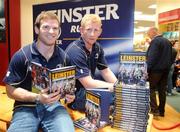 29 October 2009; Leinster's Leo Cullen and Gordon D'Arcy at the launch of Leinster's new Rugby Book entitled, Leinster, Conquering Europe, which follows the squad from the group stages, to the thrilling final against Leicester. Eason's, Dundrum Town Centre, Dublin. Picture credit: Pat Murphy / SPORTSFILE