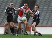 30 October 2009; Batt Moriarty, Dublin South Central, in action against Declan Sweeney, Connaught Division. Inter Divisional Garda Football Final, Dublin South Central v Connaught Division, Croke Park, Dublin. Picture credit: Pat Murphy / SPORTSFILE