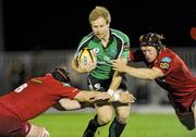 30 October 2009; Fionn Carr, Connacht, in action against David Lyons and Richie Pugh, Llanelli Scarlets. Celtic League, Connacht v Llanelli Scarlets, Sportsground, Galway. Picture credit: Ray Ryan / SPORTSFILE