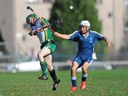 31 October 2009; John Prior, Ireland, in action against Robbie MacLeod, Scotland. Under 21 Hurling/Shinty International, Scotland v Ireland, Bught Park, Inverness, Scotland. Photo by Sportsfile