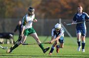 31 October 2009; Robbie MacLeod, Scotland, in action against Brian Aherne, Ireland. Under 21 Hurling/Shinty International, Scotland v Ireland, Bught Park, Inverness, Scotland. Photo by Sportsfile