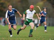 31 October 2009; Tommy Walsh, Ireland, in action against Norman Campbell, Scotland. Hurling/Shinty International, Scotland v Ireland, Bught Park, Inverness, Scotland. Photo by Sportsfile