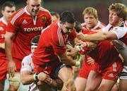 31 October 2009; David Wallace, Munster, is tackled by Bryan Young, left, and Andy Kyriacou, Ulster. Celtic League, Munster v Ulster, Thomond Park, Limerick. Picture credit: Diarmuid Greene / SPORTSFILE