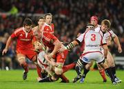31 October 2009; Paul O'Connell, Munster, is tackled by Ryan Caldwell and Brendon Botha, 3, Ulster. Celtic League, Munster v Ulster, Thomond Park, Limerick. Picture credit: Diarmuid Greene / SPORTSFILE