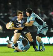 31 October 2009; Eoin Reddan, Leinster, is tackled by Rhys Williams and Ben White, right, Cardiff Blues. Celtic League, Leinster v Cardiff Blues, RDS, Dublin. Picture credit: Brendan Moran / SPORTSFILE