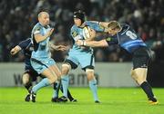31 October 2009; Ben White, Cardiff Blues, is tackled by Jamie Heaslip, Leinster. Celtic League, Leinster v Cardiff Blues, RDS, Dublin. Picture credit: Brendan Moran / SPORTSFILE