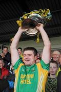 1 November 2009; South Kerry captain Stephen O'Sullivan lifts the Bishop Moynihan Cup. Kerry Senior Football County Championship Final, Dr. Crokes v South Kerry. Fitzgerald Stadium, Killarney, Co. Kerry. Picture credit: Stephen McCarthy / SPORTSFILE