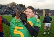 1 November 2009; Aidan 'Shine' O'Sullivan, South Kerry, celebrates with his brother Denis, 5, after their victory. Kerry Senior Football County Championship Final, Dr. Crokes v South Kerry. Fitzgerald Stadium, Killarney, Co. Kerry. Picture credit: Stephen McCarthy / SPORTSFILE