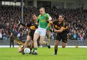 1 November 2009; Ronan Hussey, South Kerry, is fouled by John Payne, left, and James Calahane, Dr. Crokes, resulting in a penalty, which South Kerry's Bryan Sheehan converted. Kerry Senior Football County Championship Final, Dr. Crokes v South Kerry. Fitzgerald Stadium, Killarney, Co. Kerry. Picture credit: Stephen McCarthy / SPORTSFILE