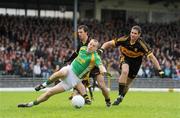 1 November 2009; Ronan Hussey, South Kerry, is fouled by John Payne, left, and James Calahane, Dr. Crokes, resulting in a penalty, which South Kerry's Bryan Sheehan converted. Kerry Senior Football County Championship Final, Dr. Crokes v South Kerry. Fitzgerald Stadium, Killarney, Co. Kerry. Picture credit: Stephen McCarthy / SPORTSFILE