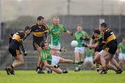 1 November 2009; John Sugrue, South Kerry, looks to offload the ball to team-mate Bryan Hickey. Kerry Senior Football County Championship Final, Dr. Crokes v South Kerry. Fitzgerald Stadium, Killarney, Co. Kerry. Picture credit: Stephen McCarthy / SPORTSFILE