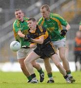 1 November 2009; David O'Leary, Dr. Crokes, in action against Niall O'Shea, left, and Ronan Hussey, South Kerry. Kerry Senior Football County Championship Final, Dr. Crokes v South Kerry. Fitzgerald Stadium, Killarney, Co. Kerry. Picture credit: Stephen McCarthy / SPORTSFILE