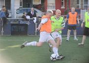 28 October 2009; Football is one of the most useful tools in breaking down misunderstandings about other cultures and spreading the anti-racism message. That's according to Fianna Fail TD for Donegal North East, Niall Blaney, who captained a group of Oireachtas members in a football match against a team of staff and diplomats from embassies based in Ireland. The match marked the culmination of 10 days of activities around the country to mark Football Against Racism in Europe ,FARE, Week 2009, which have been coordinated in Ireland by the FAI. Gerry Stedman, Taoiseach's Office, left, in action during the match. FARE Friendly, Oireachtas v Diplomats, Oliver Bond Flat Complex, Dublin. Picture credit: Brian Lawless / SPORTSFILE