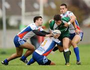 18 October 2009; John Coleman, Ireland, is tackled by Nikja Unkovi, left, Milos Milianko, centre, and Mulan Susnjara, Serbia. Rugby League International, Ireland v Serbia, Tullamore RFC, Tullamore, Co. Offaly. Picture credit: Stephen McCarthy / SPORTSFILE