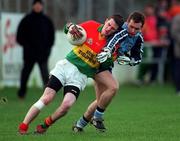 16 January 1999; Mark Carpenter of Carlow in action against Tom Lynch of Dublin during the O'Byrne Cup Quarter-Final match between Carlow and Dublin at Dr Cullen Park in Carlow. Photo by Ray McManus/Sportsfile