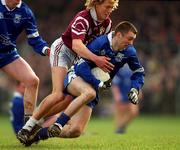 18 February 2001; Cathal Diamond of Bellaghy is tackled by Ciaran McDonald of Crossmolina during the AIB All-Ireland Senior Club Football Championship Semi-Final match between Crossmolina Deel Rovers and Bellaghy Wolfe Tones at Brewster Park in Enniskillen, Fermanagh. Photo by Ray McManus/Sportsfile