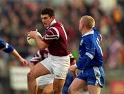 18 February 2001; Enda Lavelle of Crossmolina in action against Gareth Doherty of Bellaghy during the AIB All-Ireland Senior Club Football Championship Semi-Final match between Crossmolina Deel Rovers and Bellaghy Wolfe Tones at Brewster Park in Enniskillen, Fermanagh. Photo by Ray McManus/Sportsfile