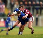 18 February 2001; Francis Glackin of Bellaghy is tackled by Stephen Rochford of Crossmolina during the AIB All-Ireland Senior Club Football Championship Semi-Final match between Crossmolina Deel Rovers and Bellaghy Wolfe Tones at Brewster Park in Enniskillen, Fermanagh. Photo by Ray McManus/Sportsfile