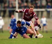 18 February 2001; Cathal Scullion of Bellaghy is tackled by Tom Nallen of Crossmolina during the AIB All-Ireland Senior Club Football Championship Semi-Final match between Crossmolina Deel Rovers and Bellaghy Wolfe Tones at Brewster Park in Enniskillen, Fermanagh. Photo by Ray McManus/Sportsfile