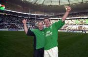 19 March 2000; Ireland's Denis Hickie and team masseur Willie Bennett celebrate following the Six Nations Rugby Championship match between France and Ireland at Stade de France in Paris, France. Photo by Matt Browne/Sportsfile