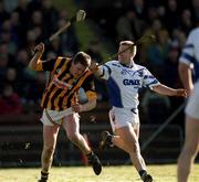 18 February 2001; Tom Drennan of Kilkenny is tackled by Brian Flannery of Waterford during the Allianz National Hurling League Division 1B match between Waterford and Kilkenny at Walsh Park in Waterford. Photo by Aoife Rice/Sportsfile