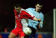 23 February 2001; Michael Holt of St Patrick's Athletic in action against Pat Scully of Shelbourne during the Eircom League Premier Division match between St Patrick's Athletic and Shelbourne at Richmond Park in Dublin. Photo by Brendan Moran/Sportsfile