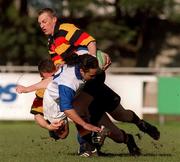 24 February 2001; Eddie Hekenui of St Mary's College is tackled by Aidan McCullen and David Quigley of Lansdowne  during the AIB All-Ireland League Division 1 match between St Mary's College RFC and Lansdowne RFC at Templeville Road in Dublin. Photo by Matt Browne/Sportsfile