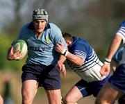 24 February 2001; Michael Collins of UCD is tackled by Geoff Alderdice of Portadown during the AIB All-Ireland League Division 2 match between UCD and Portadown at Belfield in Dublin. Photo by Aoife Rice/Sportsfile